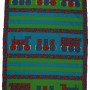 Shows the Choo Choo quilt which is based on a toy train design. The colours are bright blue, red and green.