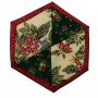 One of six patchwork Christmas Coasters. This one has triangular and Diamond shapes inside a red border.