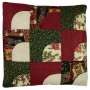 Shows the jockeys cap cushion cover in traditional Christmas colours; Green, red and gold. The cushiois made from nine square panels in a 3 x 3 arrangement.