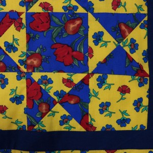 Close-up detail of Ohio Star Tablecloth showing four panels.