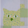 This shows one panel of the Puss In The Corner quilt where the cute kittys' face is visible.