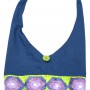 A blue shoulder bag with green and purple details.