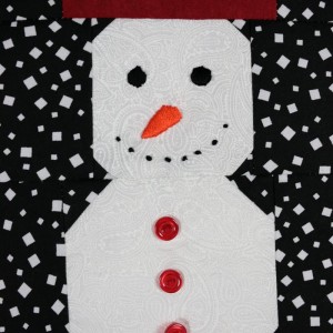 A detail of the snowman panel - a head and shoulders shot of the snowman.