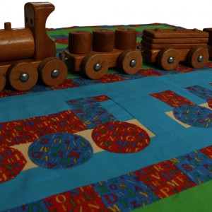 A view of the toy wooden train that inspired the Choo Choo design.